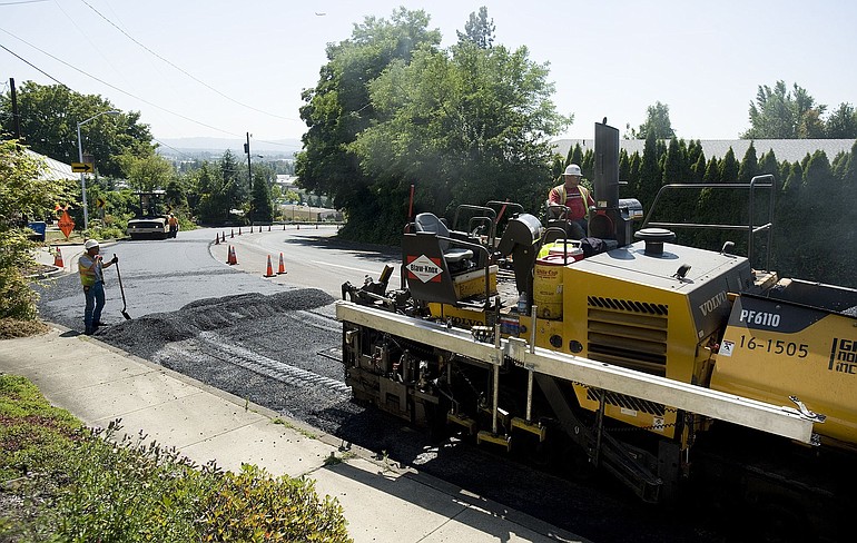 Work continued on Grand Boulevard south of Mill Plain on Wednesday. Overlay, microsurfacing and slurry seal work will run through August on numerous arterials and neighborhood streets.