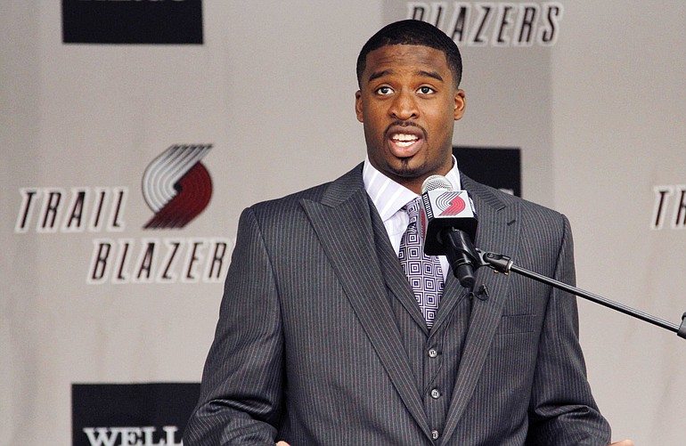Basketball player Wesley Matthews speaks during a news conference after it is announced that he h
