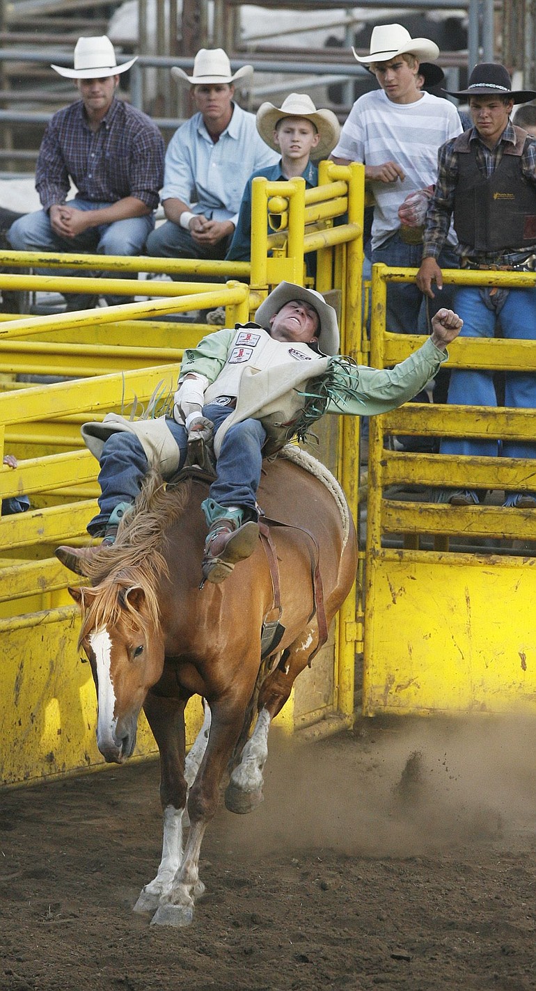 Austin Foss, of Redmond, Ore., competes in the rodeo action at the Clark County Fair on Monday.