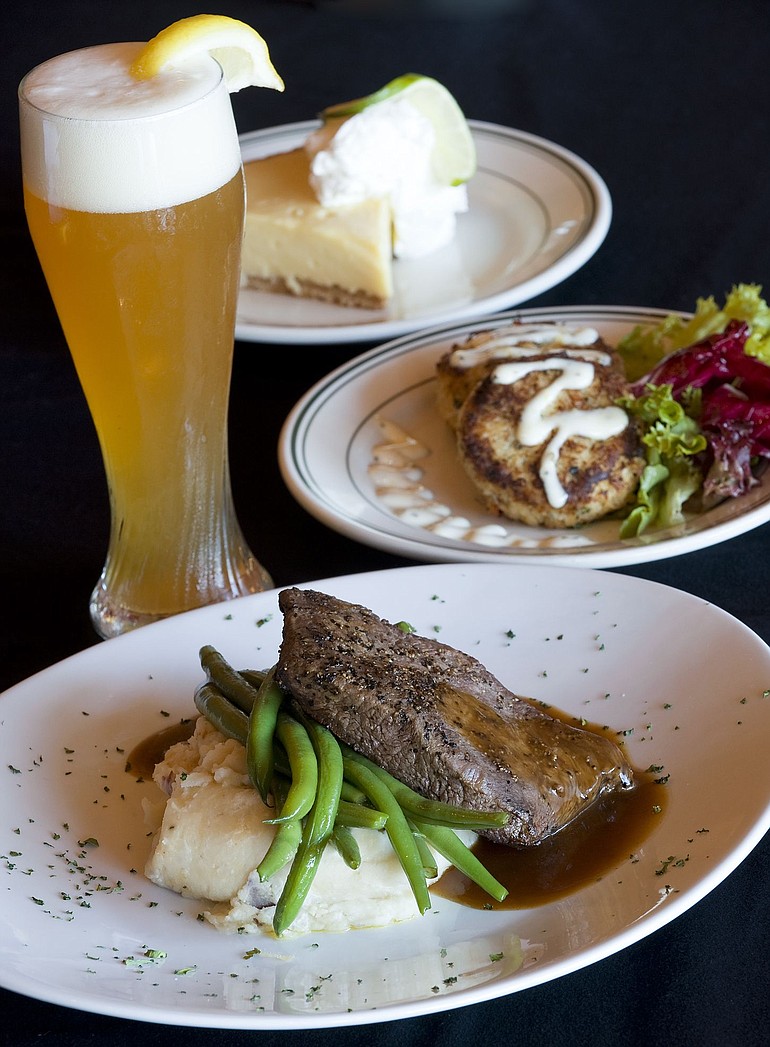 Flat iron steak, crab cakes and Key lime pie feature local ingredients at Paparazzi in Battle Ground.