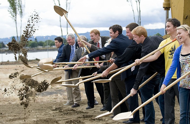 Elected officials, including Rep. Brian Baird, Sen. Patty Murray, Mayor Tim Leavitt, and local high school student body presidents grabbed golden shovels to break ground on the waterfront infrastructure access work Wednesday.