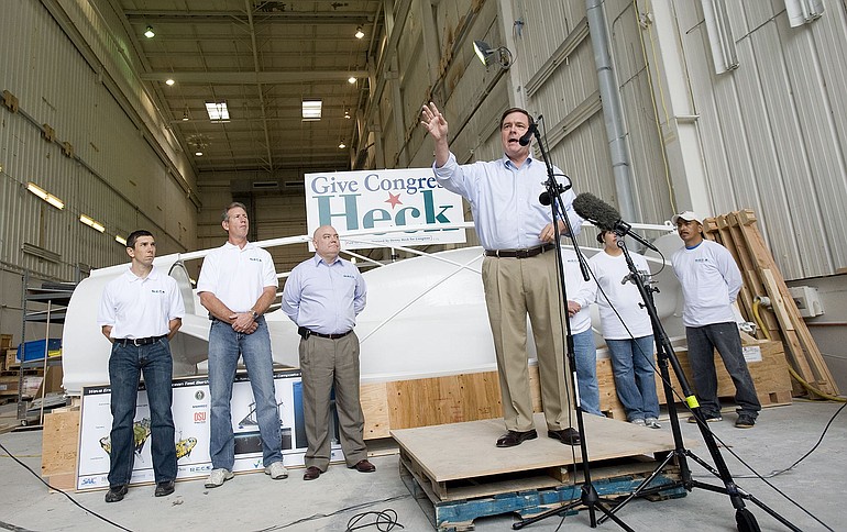 Congressional candidate Denny Heck talked green jobs to a friendly crowd at Renewable Energy Composite Solutions in Vancouver on Tuesday as he kicked off a five-week jobs tour.