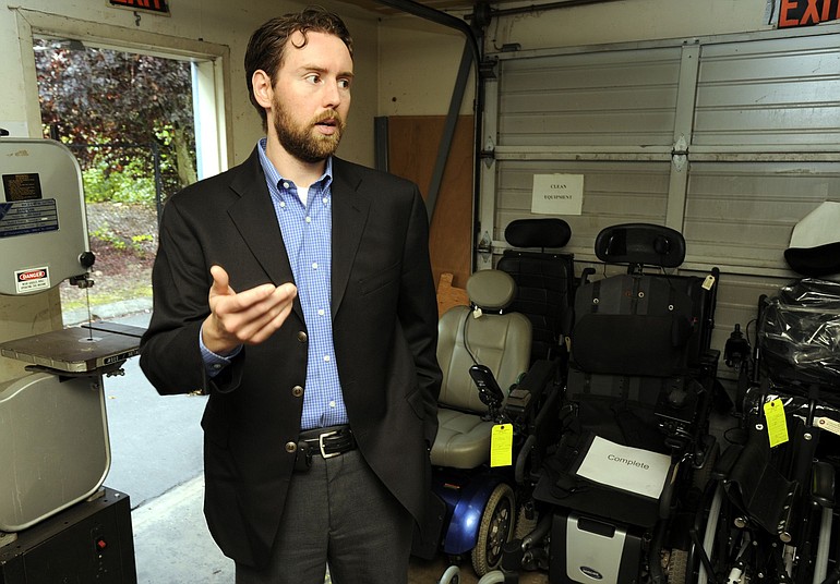 Robert Lee, director of government affairs and health policy analyst for Care Medical &amp; Rehabilitation Equipment, stands in the company's storage area, where wheelchairs and other medical equipment are located, inside its Vancouver office.