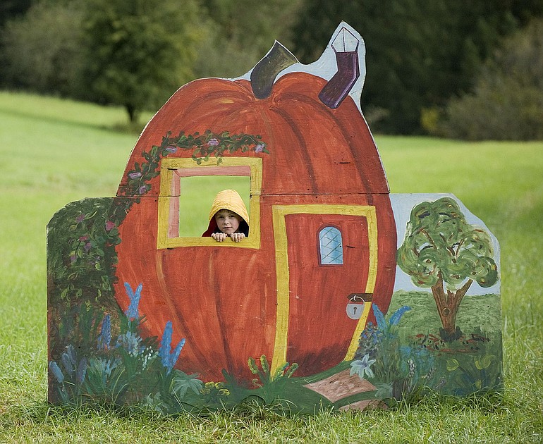A visitor is locked in the pumpkin house at Pomeroy Living History Farm, which offers kid-friendly Halloween options.