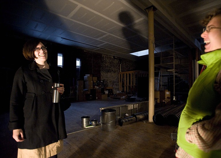 Sam MacKenzie, right, president of Mosaic Arts Alliance, and Jamie Lutz Carroll, vice president, tour the space for Mosaic's new venue, Gallery 360.
