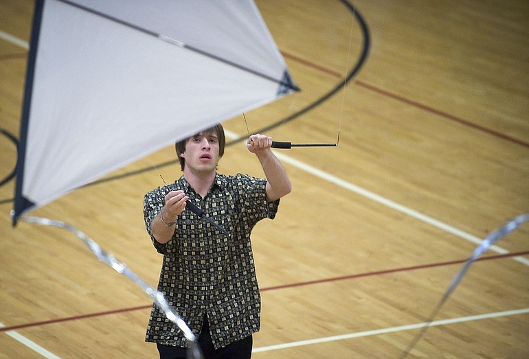 Connor Doran demonstrates indoor kite flying on Sunday.