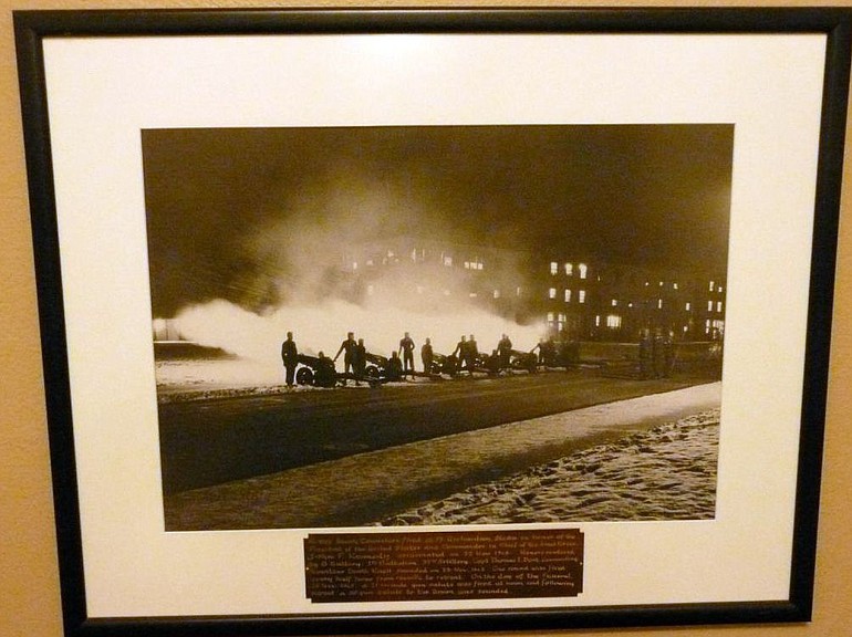 This is the main piece of the JFK memorial created by Tom Dent's father: a photo of a cannon battery firing a salute to the fallen president.