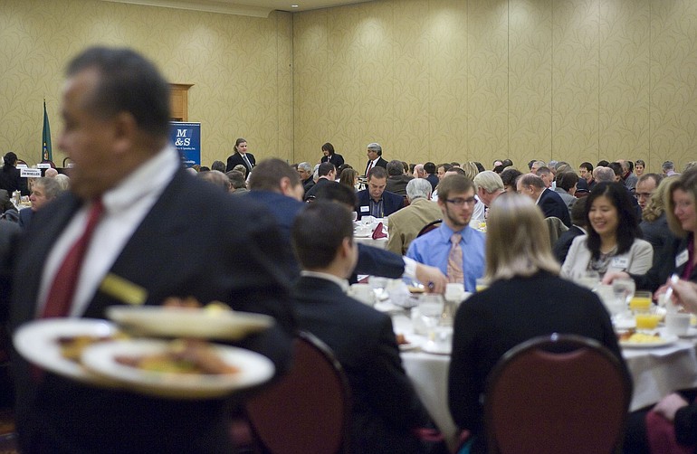 State lawmakers, local officials and business leaders share a meal during the annual legislative breakfast at the Hilton Vancouver Washington on Friday.