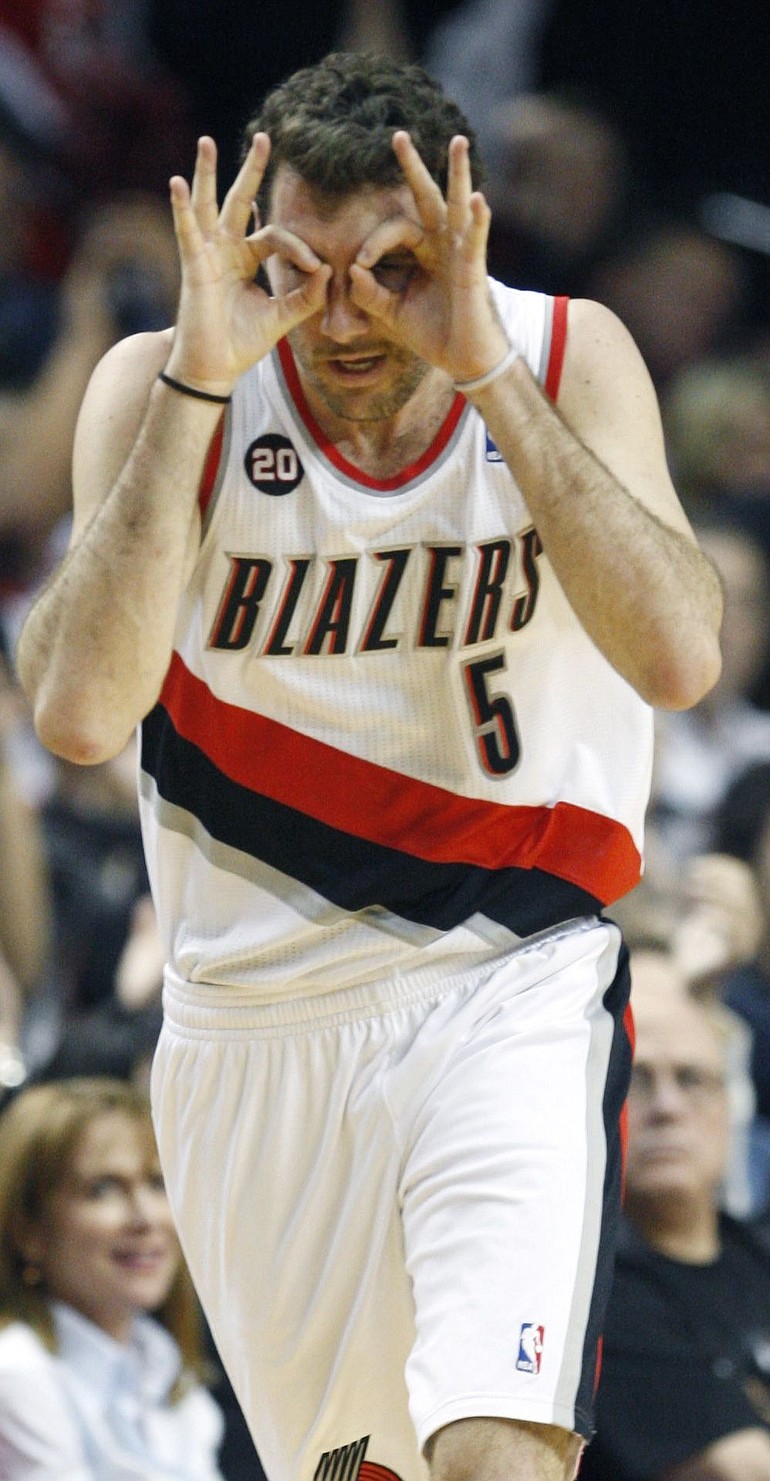 Rudy Fernandez (5) sports his &quot;3 Goggles&quot; after knocking down a 3-pointer.