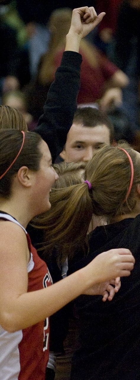 The Camas girls basketball team celebrated a monumental win over Prairie in the district championship game in February.