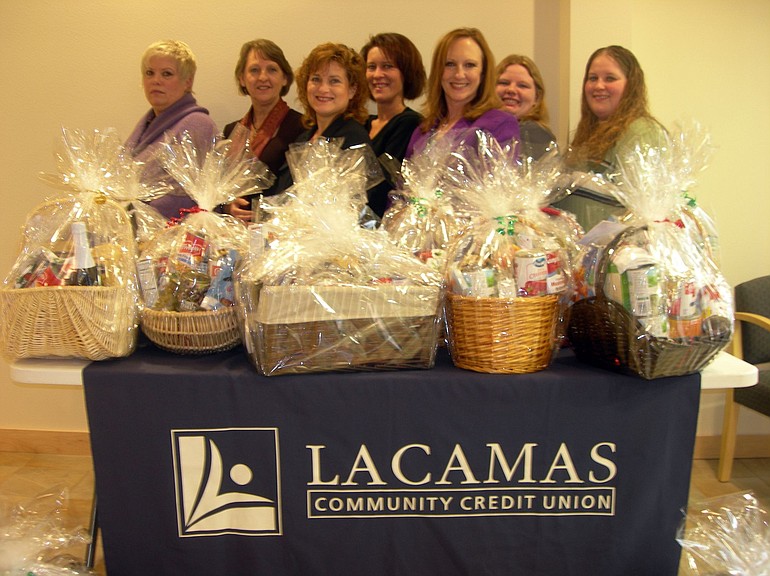 Lacamas Community Credit Union staffers, from left, Linda Bolton, Marsha Leifsen, Eve Rossmiller, Sherri Smith, President and CEO Kathleen Romane, Sarah Giddens and Hillery Losli.