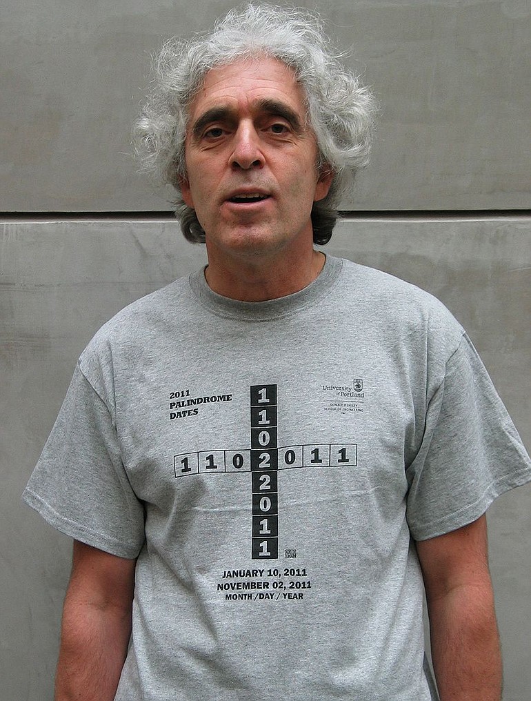 University of Portland professor Aziz Inan models his custom palindrome T-shirt.