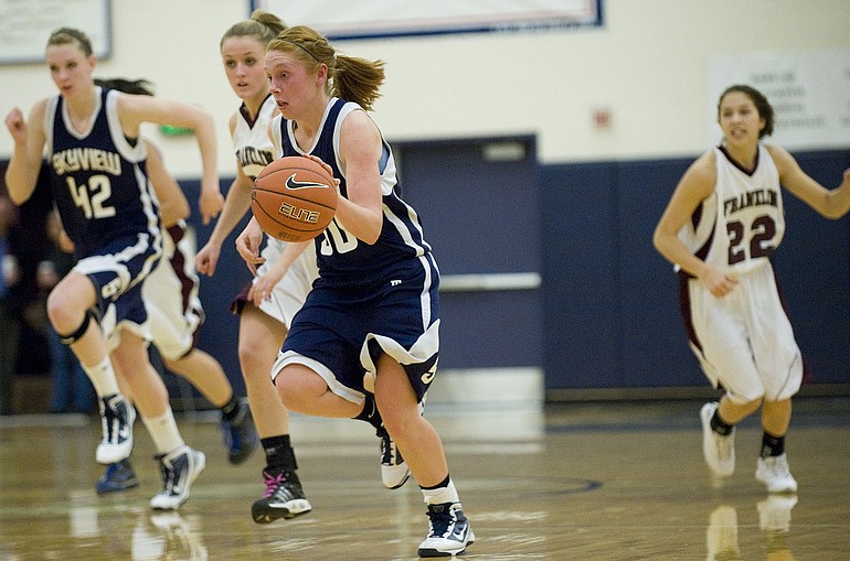 Skyview's Maddie Van Liew brings the ball up court against Franklin High School at the Nike Interstate Shootout in Lake Oswego, OR, Saturday,  December 26, 2009.