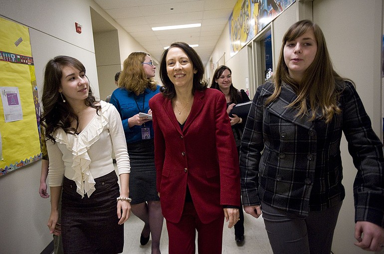 Sen. Maria Cantwell, center, is escorted to the Heritage High biodiesel lab Friday by students Roxy Fairchild, 18, left, and Casey Bahr, also 18.