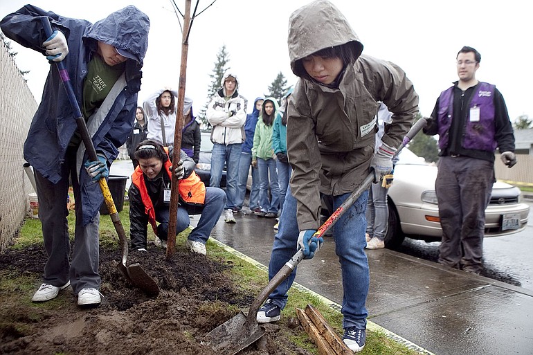 Ketta Inthathirath, 16, and Christian Tunoa, 15, joined other members of Evergreen High School's Key Club to volunteer with Friends of Trees on Saturday.