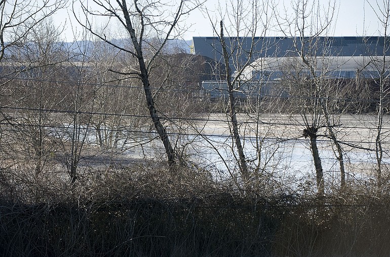 The state Department of Health has found that this pond, next to General Chemical at 2611 W. 26th Ave., contains radium concentrated enough to require a license.