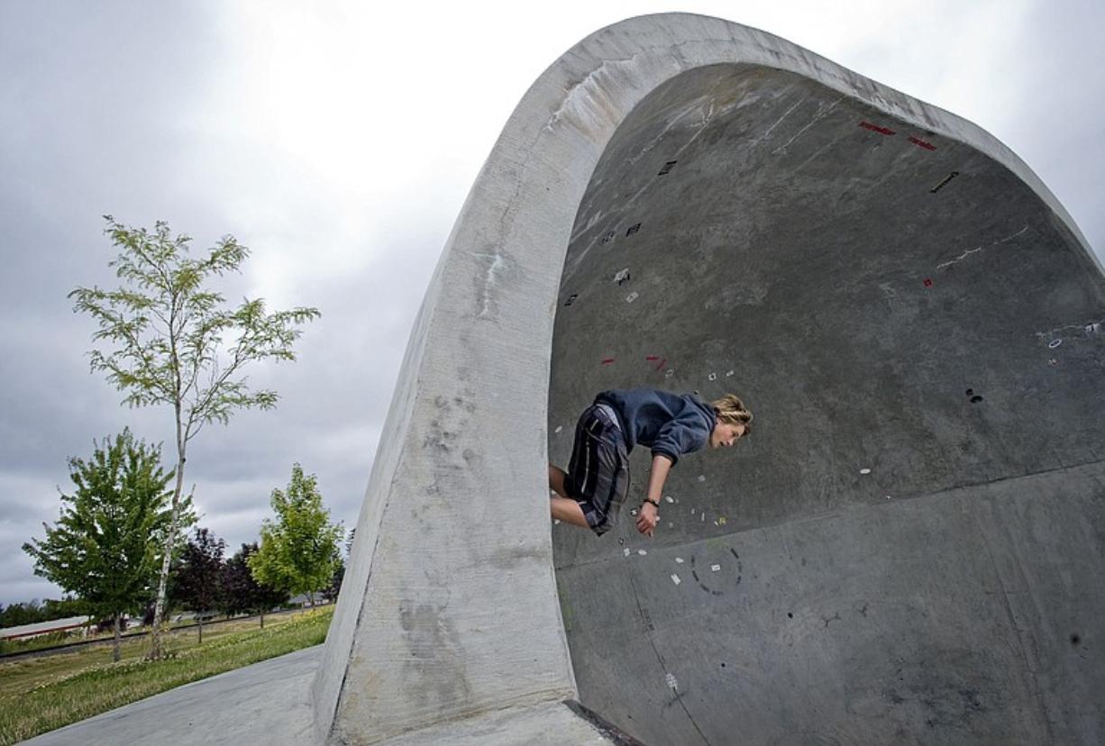 Taryn Maloney, 15, of Battle Ground skates the bowl at Battle Ground skate park this summer.