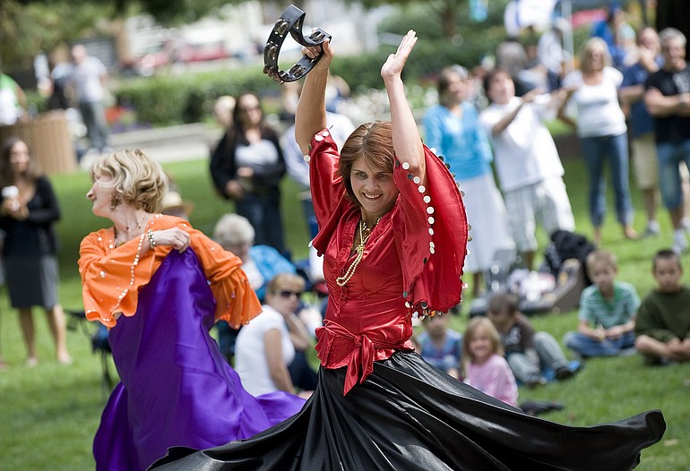 Katya Ponomareva, from the Russian Community Center in Redmond, dances a traditional dance at the Russian-American Cultural Festival at Esther Short Park in August 2010.