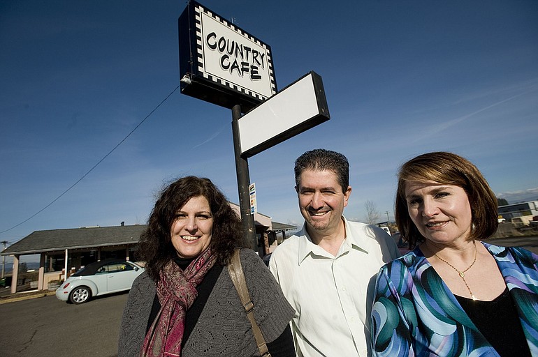 Carrie Dennis, left, sold Ridgefield-based Country Cafe to new owners Jose Guitron and Maria Mendez.