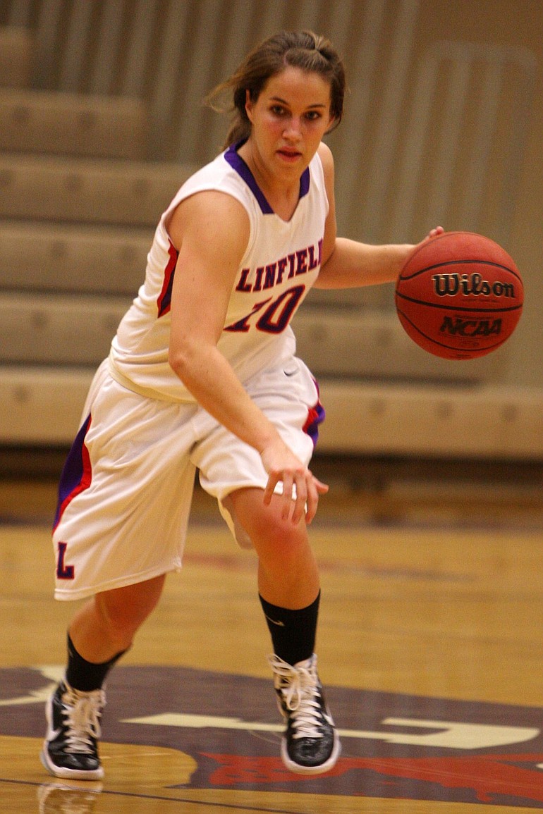 After playing intraumural basketball at Linfield, Abby Olbrich decided to see if she could help the Wildcats.
