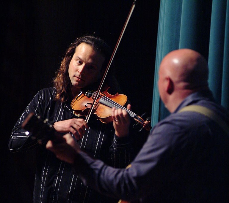 Violinist Aaron Meyer and guitarist Tim Ellis rock out at Skyview High School on Feb.