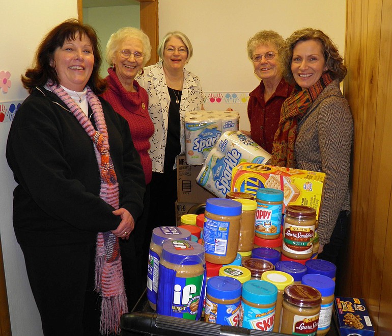 Soroptimist International of Camas-Washougal club members deliver peanut butter and food to the East County Family Resource Center.