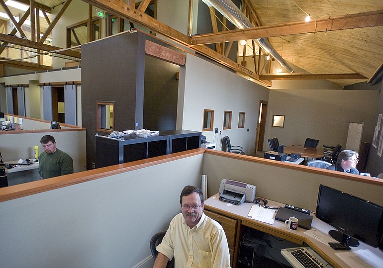 Sigma Design owner Bill Huseby works at an open desk rather than in a closed office.