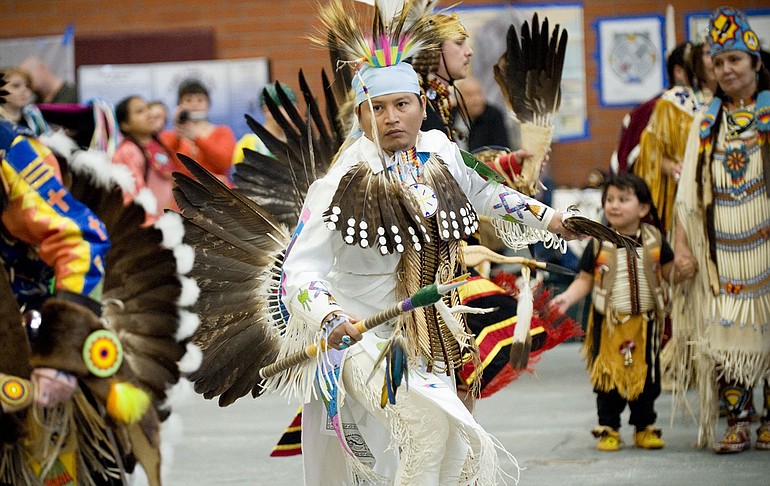 David Yelloweyes danced at a the Powwow at Covington Middle School on Saturday, the first time he's danced in a year and a half after his feather regalia wa stolen.