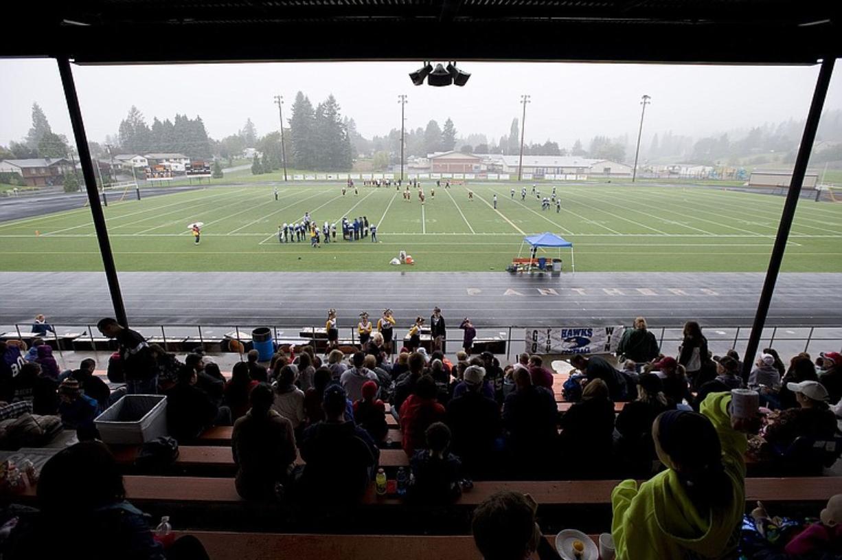 Clark County Youth Football teams play a game on the turf at Washougal's Fishback Stadium in October.