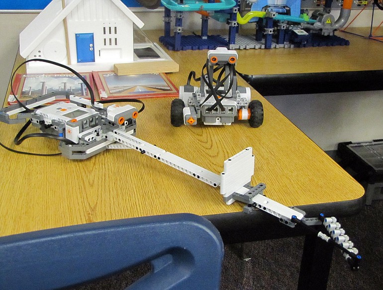 A three-wheel cruiser and electric guitar were built by an after-school robotics team at Burton Elementary School. A new grant by the nonprofit Washington STEM group will bring several more robotics kits for use in Burton's fifth-grade classrooms.