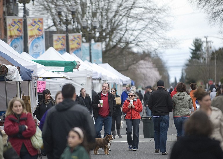 Shoppers bundle up on Sunday during the opening weekend of the 2011 Vancouver Farmers Market.