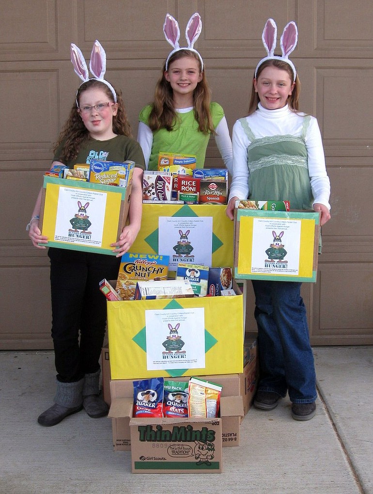 Clark County 4-H Country Critter Rabbit Club held a spring food drive &quot;Bunnies Battling Hunger.&quot; Pictured from left are Sophie Hatch, Mallory Downing, and Quiara Olvera.