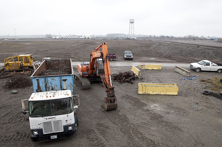 Crews at the Port of Vancouver's Terminal 5 move rocks and gravel to prepare the area to store wind energy components in 2015.