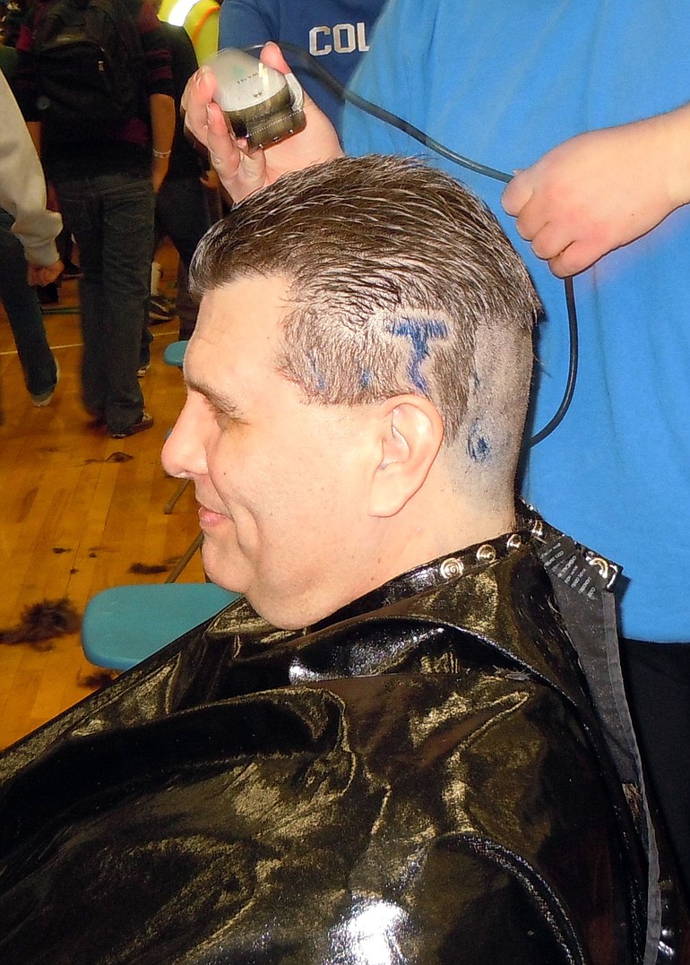 Mountain View High School Principal Mike Meloy got his head shaved March 21 to raise money for Doernbecher Children's Hospital.