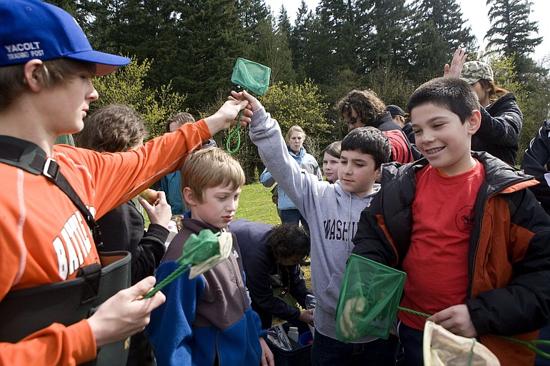 Children and teens prepare to count reptiles and frogs at the 2010 Critter Count.