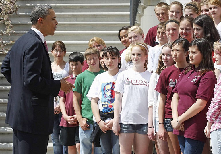 President Obama meets students from Altona Middle School in Longmont, Colo., on the South Portico of the White House on Monday.