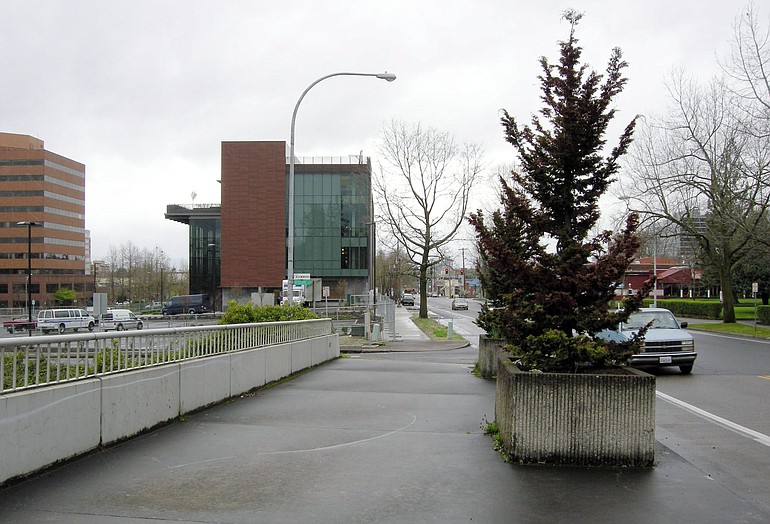 Recent projects, such as plans to replace the dead trees on this Interstate 5 overpass leading into downtown Vancouver, will help create a favorable impression to visitors on their way to the new $38 million Vancouver Community Library, set to open in July.