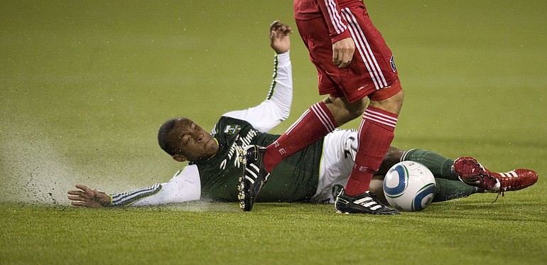 Portland's Rodney Wallace slides for a ball against the Chicago Fire on Thursday.