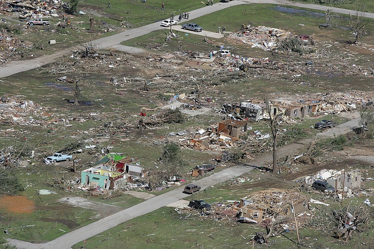 An aerial of a single block of Smithville Ms., on Thursday shows how much destruction the small town took on Wednesday leaving 13 dead and the town destroyed.