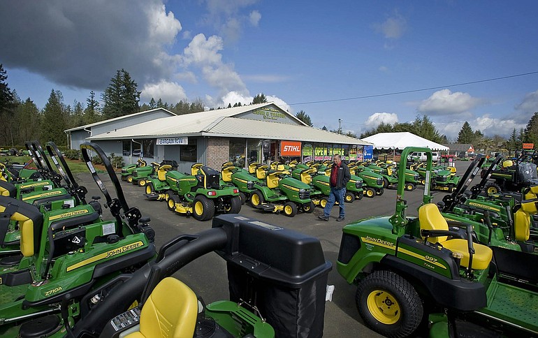 Ron Boutwell of Ridgefield looks for a lawn mower at Clark County Lawn &amp; Tractor.