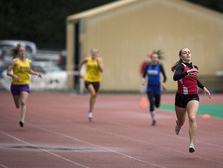 Camas standout Megan Kelley won district titles in the 100 meters and the 400 on Wednesday, and will try for a 200 victory today.
