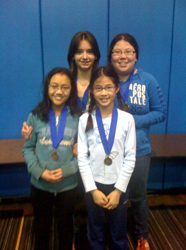 Shahala Middle School students Alia Hidayat, from left, Amika Parr, Patricia Chen and Seraphina Meacham took first place in the Washington State National History Day competition.