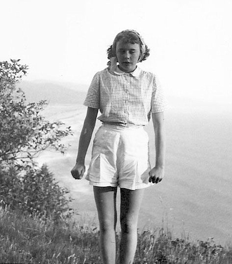 Jan Thompson at 14, looking cold but enjoying her visit to the Oregon Coast.