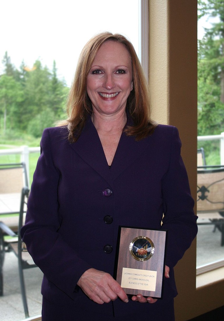 Kathleen Romane, CEO of Lacamas Community Credit Union, accepted the 2011 Business of the Year Award.