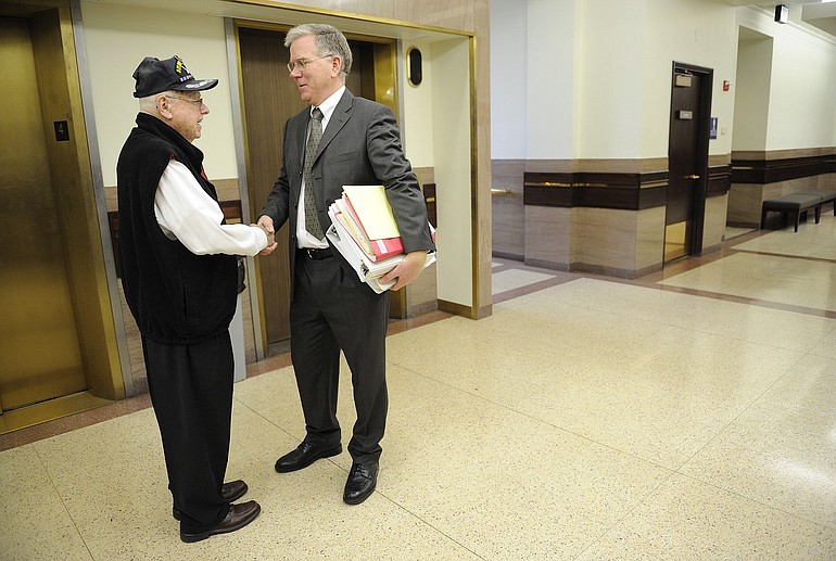 Lyle Patterson, the father of Hudson's Bay teacher Gordon Patterson, meets Clark County Deputy Prosecuting Attorney Jim David in January 2010 after Antonio Cellestine was sentenced to five years in prison in Gordon Patterson's hit-and-run death.