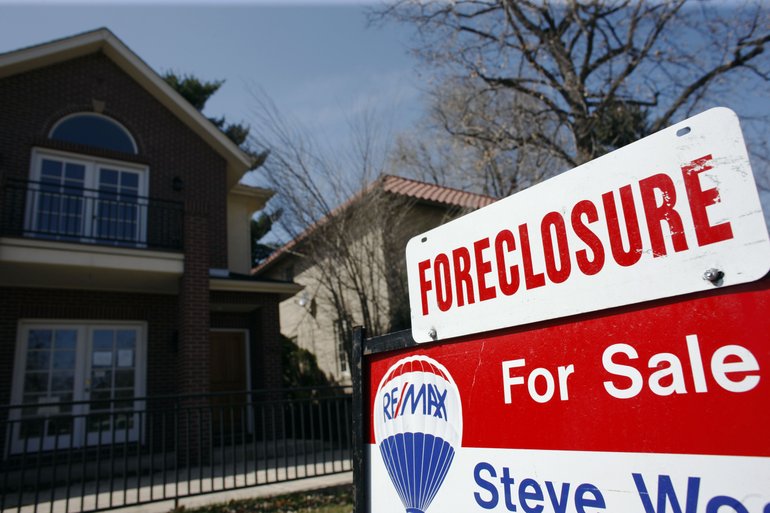 Clark County foreclosures dropped by 25 percent in 2011, though homeowners continued to run into trouble at far greater rates than before housing prices began to slide in 2006, according to a report issued Wednesday.