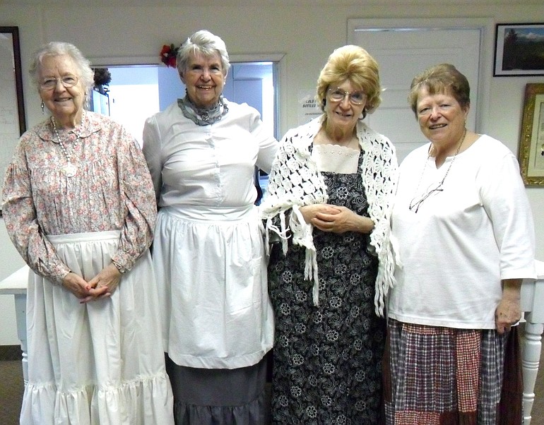 Amboy: Dottie Person, from left, Beverly Ervin, Arpa Martell and Sandy Ruff attended the meeting in the spirit of pioneers.