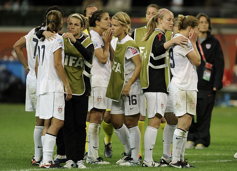 US players react after losing the final match Sunday between Japan and the United States at the Womenis Soccer World Cup in Frankfurt, Germany.
