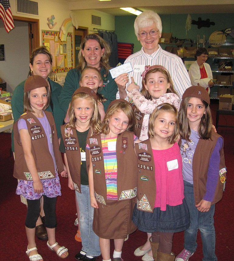 Girl Scout Brownie Troop 42561 donated $255 to Babies in Need. Back row, leaders Amy Surface and Libby Odren, and Director of Babies in Need Kitty Ash.