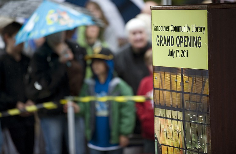 Hundreds brave the rain for the grand opening of the Vancouver Community Library this afternoon.